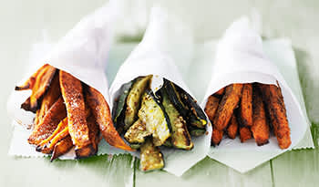 Carrot, zucchini, and sweet potato fries on table