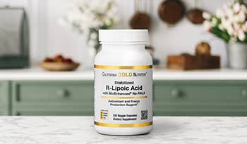 R-Lipoic Acid supplement bottle on counter of kitchen