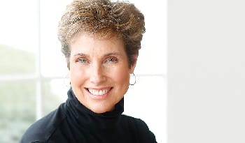 portrait of middle aged woman wearing black turtleneck