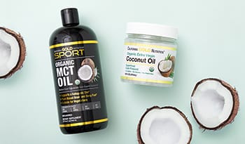 MCT oil and coconut oil with coconuts