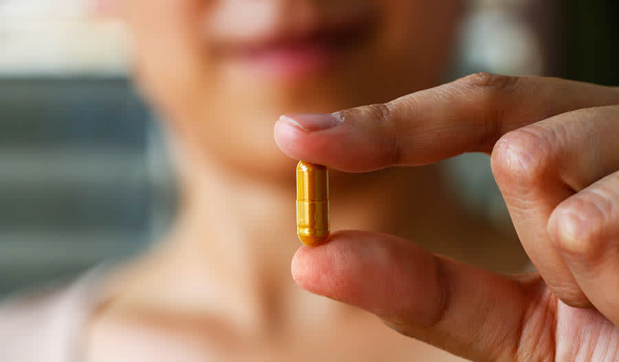 How does iHerb ensure product authenticity and quality for its customers?