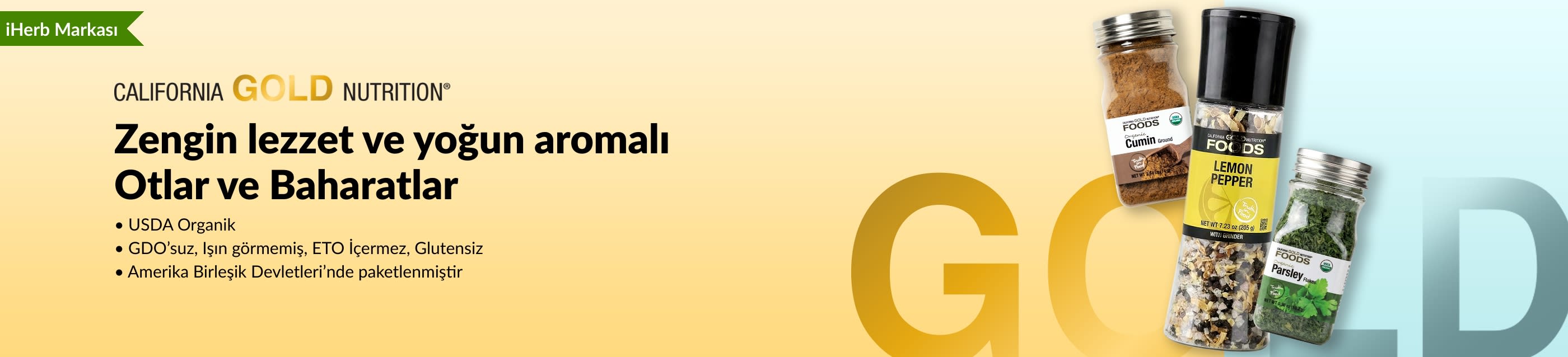 California Gold Nutrition otlar ve baharat banner’ında kimyon, limonlu karabiber ve maydanoz şişeleri yer alıyor.