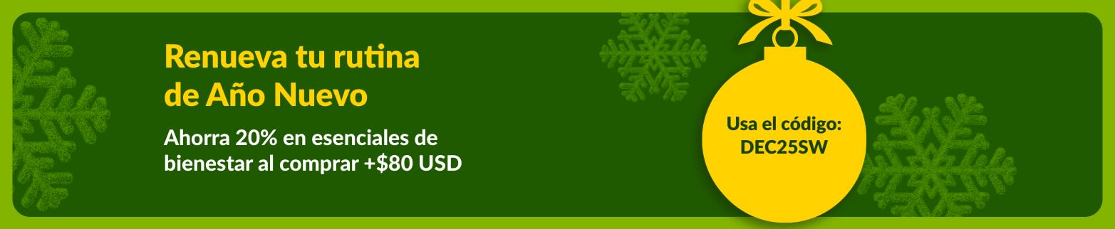 Banner de iHerb para Año Nuevo. Fondo verde con un adorno amarillo. Texto: 'Renueva tu rutinade Año Nuevo. Ahorra 20% en esenciales de bienestar al comprar más de $80 USD. Usa el código DEC25SW'.