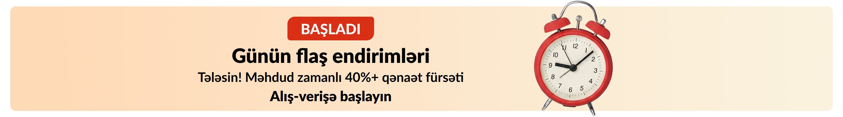 Qırmızı zəngli saat şəkli olan flaş endirim banneri. Mətn: Hazırda davam edir - Günün Flaş Endirimləri. Məhdud zamanlı 40%+ qənaət fürsəti.