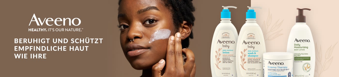 Aveeno banner showcasing lotions and creams for sensitive skin, featuring woman applying moisturizer and product lineup.