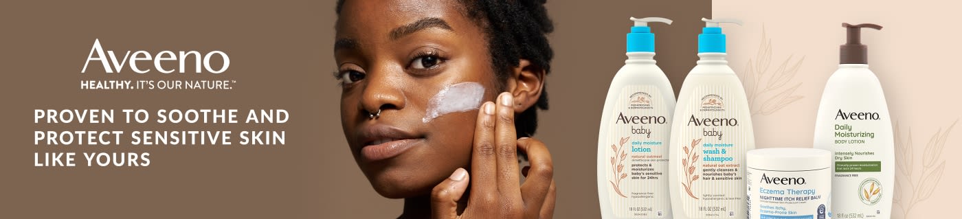 Aveeno banner showcasing lotions and creams for sensitive skin, featuring woman applying moisturizer and product lineup.