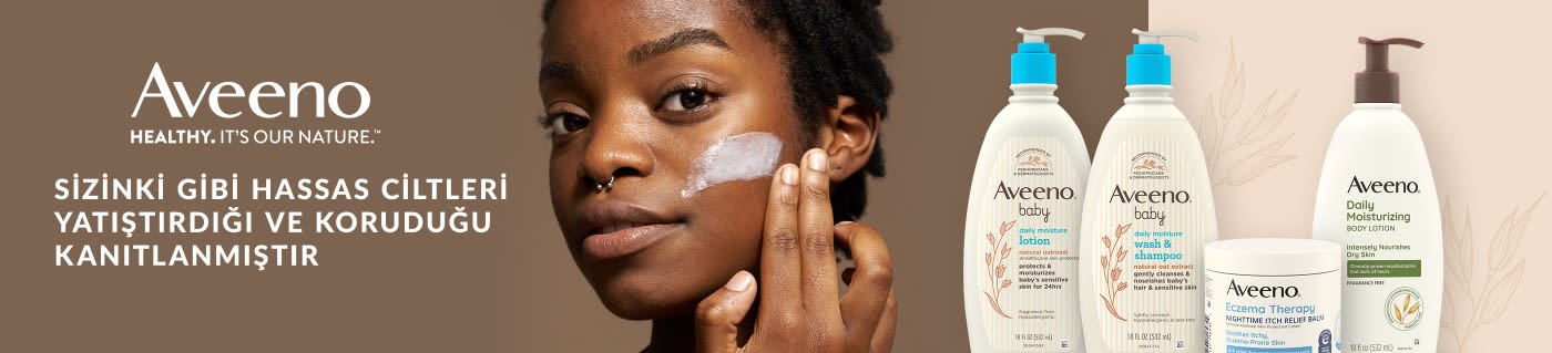 Aveeno banner showcasing lotions and creams for sensitive skin, featuring woman applying moisturizer and product lineup.