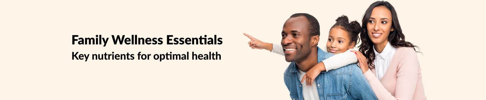 Smiling family with child promotes family wellness essentials and key nutrients for optimal health.