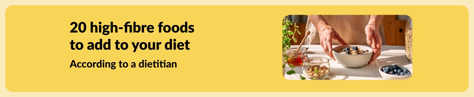 Banner promoting article “20 High-Fibre Foods to Add to Your Diet” with image of hands preparing a healthy bowl with blueberries.