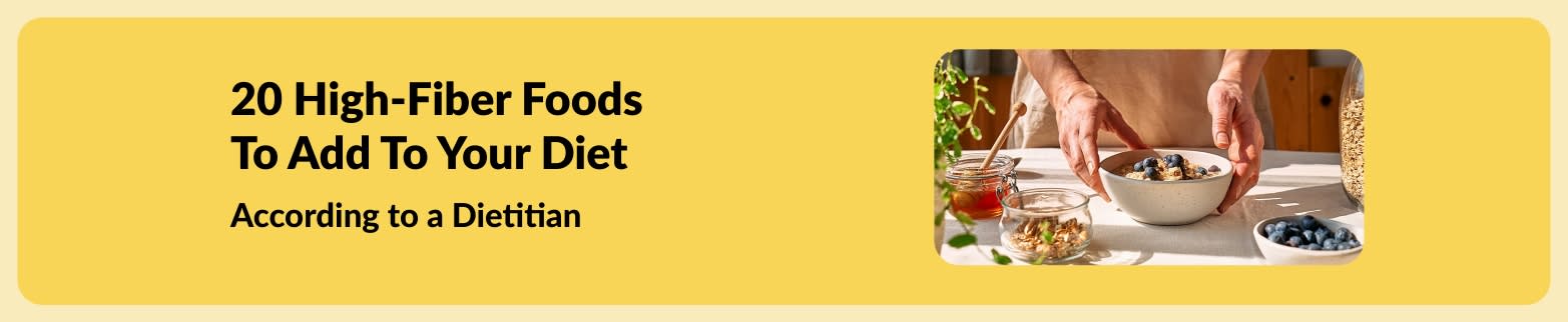 Banner promoting article “20 High-Fiber Foods to Add to Your Diet” with image of hands preparing a healthy bowl with blueberries.