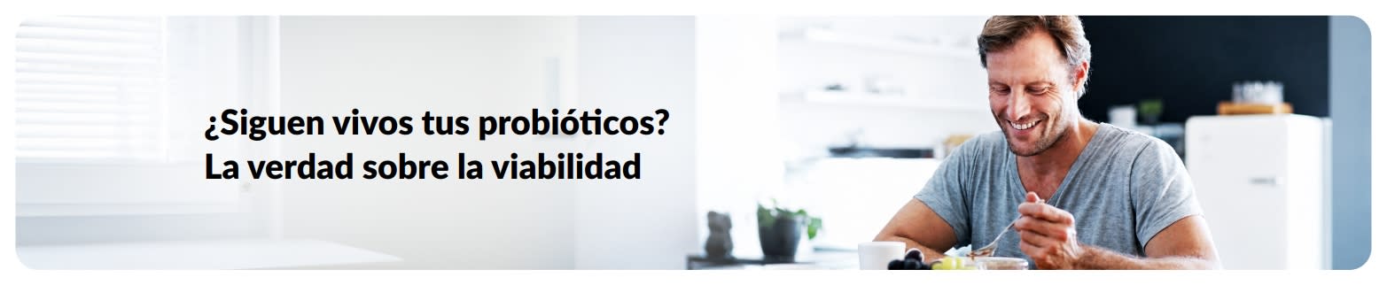 Banner de un artículo sobre viabilidad de probióticos: hombre desayunando y texto sobre cómo mantener vivos los probióticos.