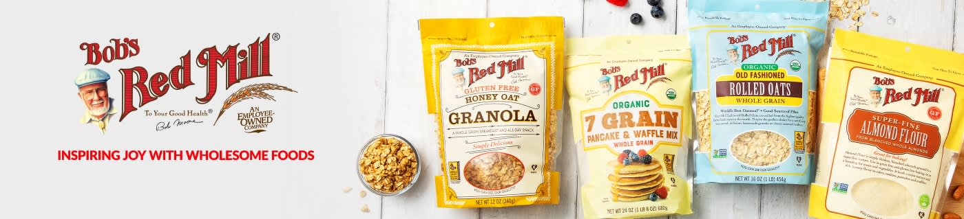 Bob’s Red Mill banner showcasing granola, pancake mix, rolled oats, and almond flour with slogan “Inspiring Joy with Wholesome Foods.