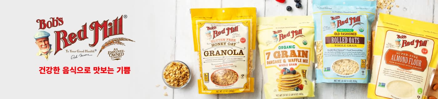 Bob’s Red Mill banner showcasing granola, pancake mix, rolled oats, and almond flour with slogan “Inspiring Joy with Wholesome Foods.