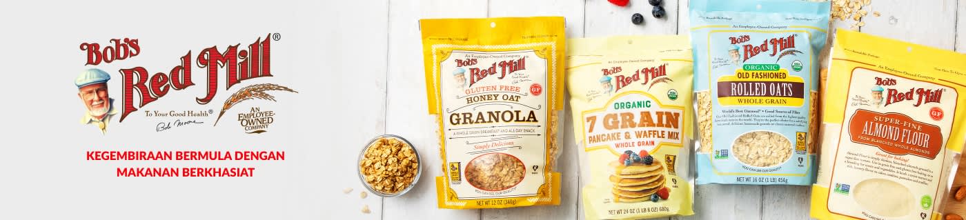 Sepanduk Bob's Red Mill memaparkan granola, adunan penkek, oat gulung dan tepung badam dengan slogan “Inspiring Joy with Wholesome Foods.