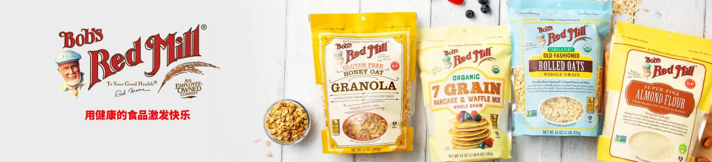 Bob’s Red Mill banner showcasing granola, pancake mix, rolled oats, and almond flour with slogan “Inspiring Joy with Wholesome Foods.