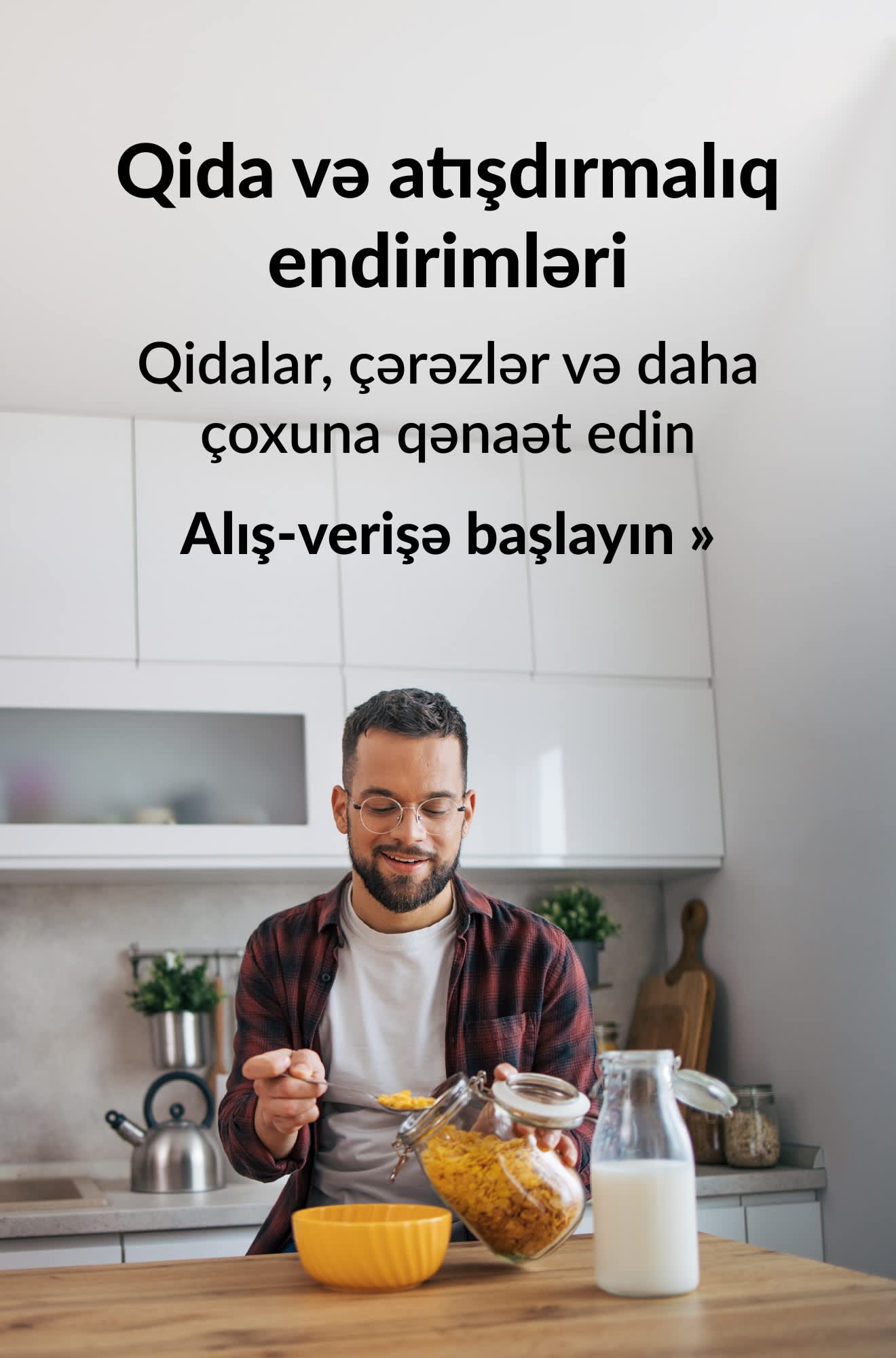 Ərzaq və atışdırmalıq məhsullarına endirimləri təbliğ edən banner. Alış-verişə başlayın.