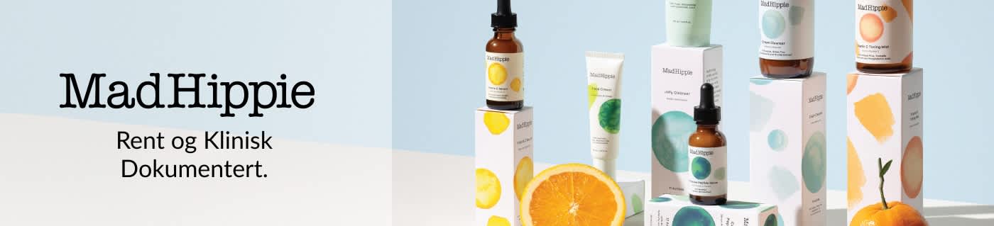 Mad Hippie hudpleieprodukter presentert med frukt og minimalistisk emballasje som fremmer rene, klinisk dokumenterte formler.