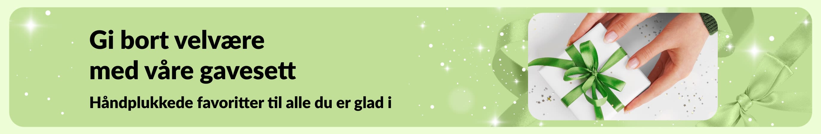 iHerb gavesett-banner med utvalgte gavepakker for selvpleie og skjønnhet, perfekte for alle på listen din.