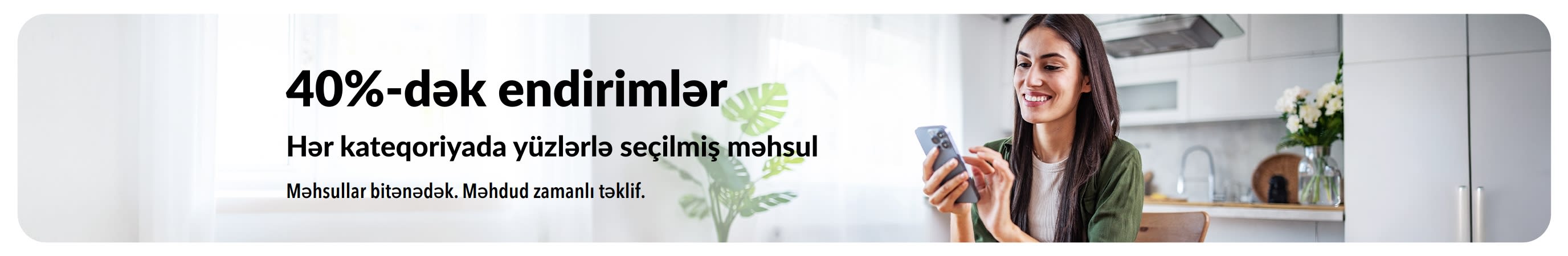 40%-dək endirimləri təbliğ edən banner