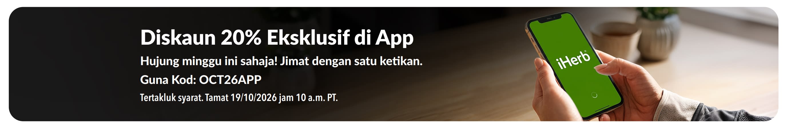 Sepanduk promo Diskaun 20% Jualan Eksklusif di App menunjukkan telefon pintar dengan logo iHerb. Dengan teks: 