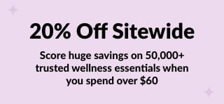 Excited couple shopping online with promo code JUL25SW for 20% off wellness products sitewide on orders over $60.