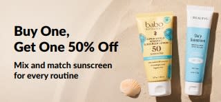 iHerb sunscreen promo banner offering buy one get one 50% off, featuring two SPF skincare products for daily use.