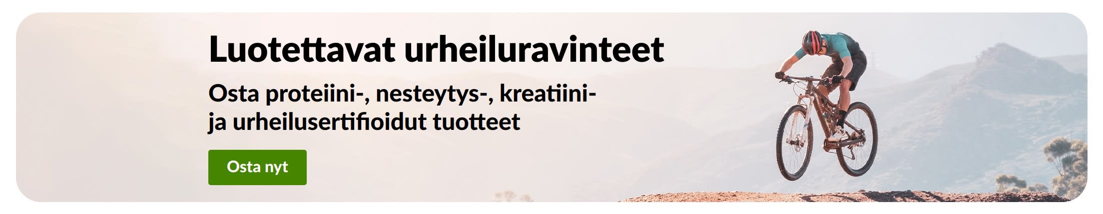 Luotettavat urheiluravinteet -banneri, jossa maastopyöräilijä sekä proteiini-, nesteytys-, kreatiini- ja urheilusertifioitujen tuotteiden Osta nyt -painike.