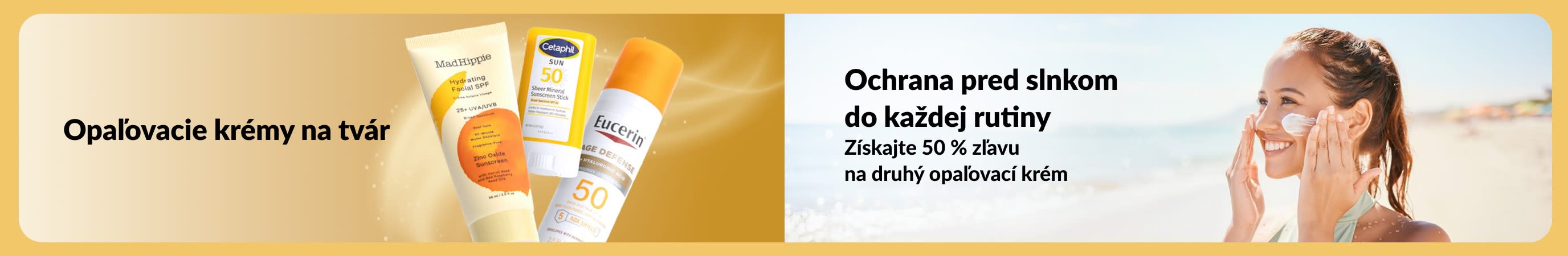 Baner s opaľovacími krémami na tvár vedľa ženy, ktorá si natiera pleť na pláži. Propaguje 50 % zľavu na druhý produkt.