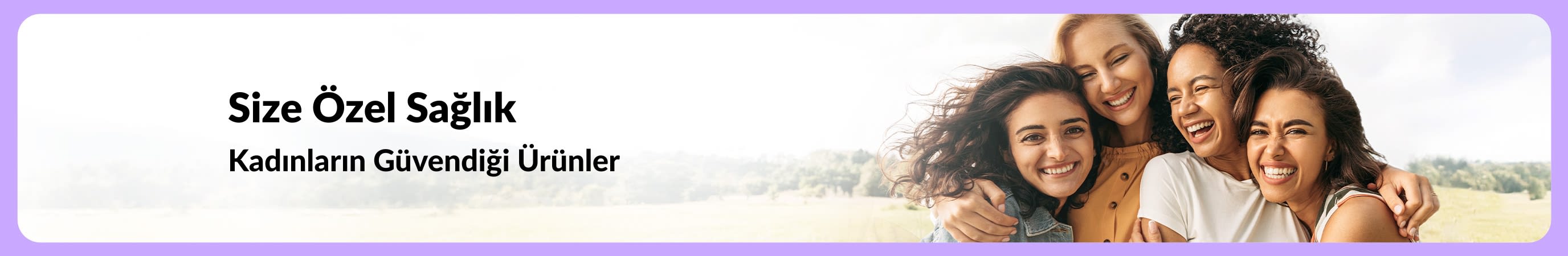 Banner with the headline “Wellness That Gets You – Trusted Products for Every Woman” beside four smiling women embracing outdoors against a soft natural landscape.