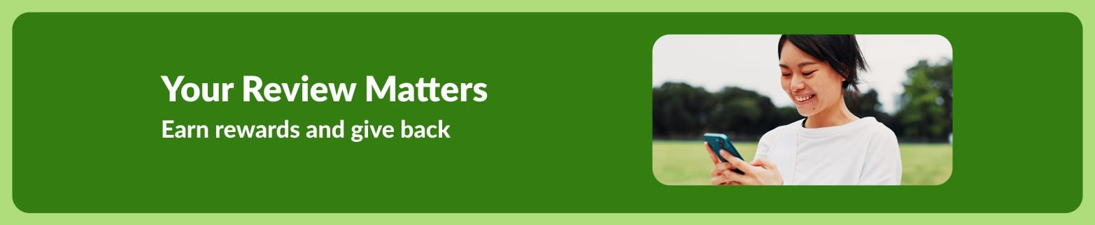 iHerb banner encouraging customers to leave reviews, featuring a smiling person using a smartphone outdoors.